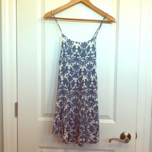 Blue print floral on white dress. Lace up back.